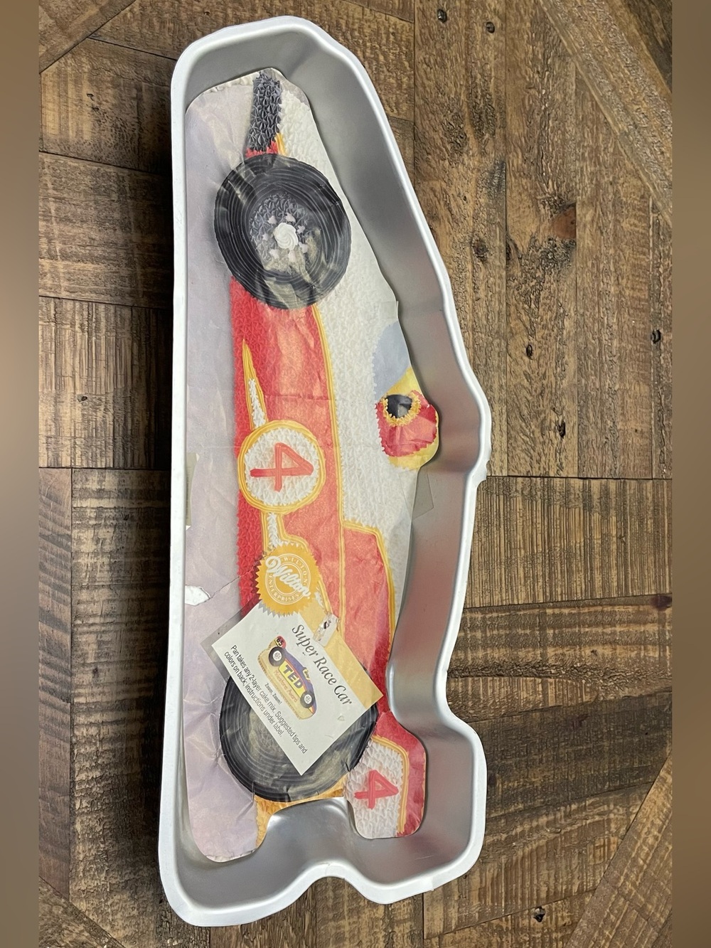 vintage Wilton Super Race Car Cake Pan, a novelty shaped aluminum baking mold.